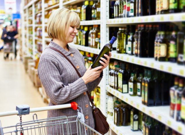 woman shopping cooking oils