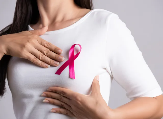 Woman with breast cancer ribbon