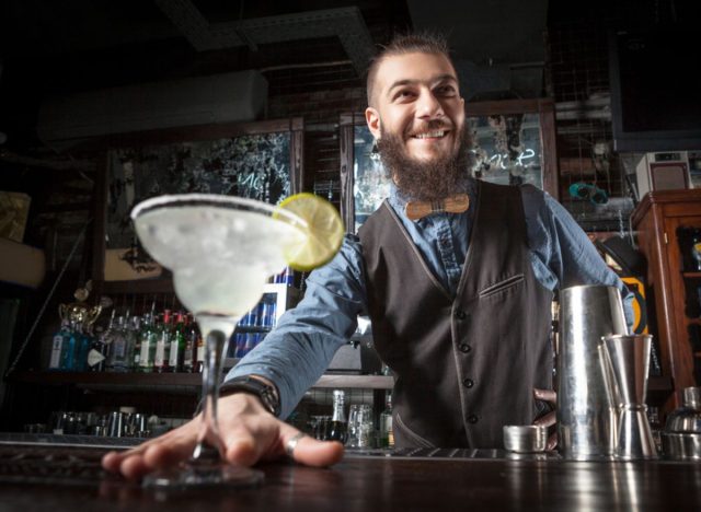 bartender giving margarita