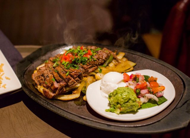 cantina laredo fajitas with side of guac and pico de gallo