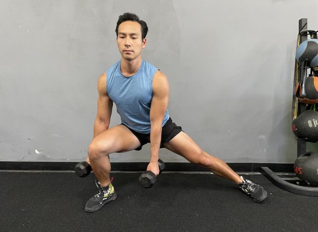 Dumbbell side lunges to contract your abs