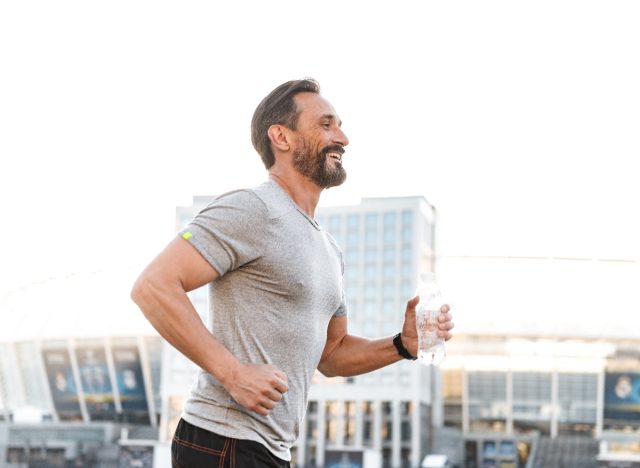 fit middle-aged man running, demonstrating how to jumpstart your metabolism after 40