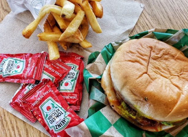 henry's hamburgers fries, ketchup packets, and burger