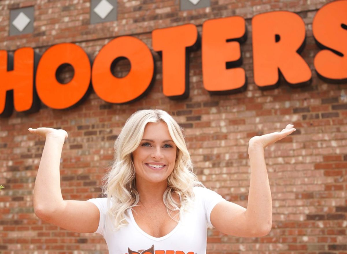 Hooters server and sign