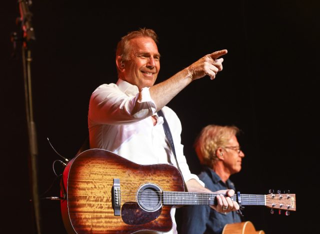 Kevin Costner and Modern West onstage performance