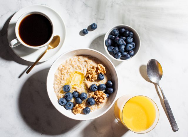oatmeal with blueberries and walnuts, coffee, and orange juice