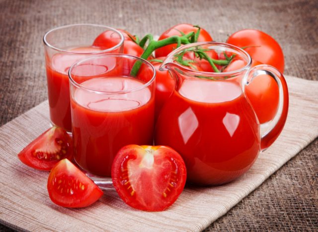 pitcher and glass of tomato juice