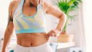 woman demonstrating concept reduct your gut after 40 workout