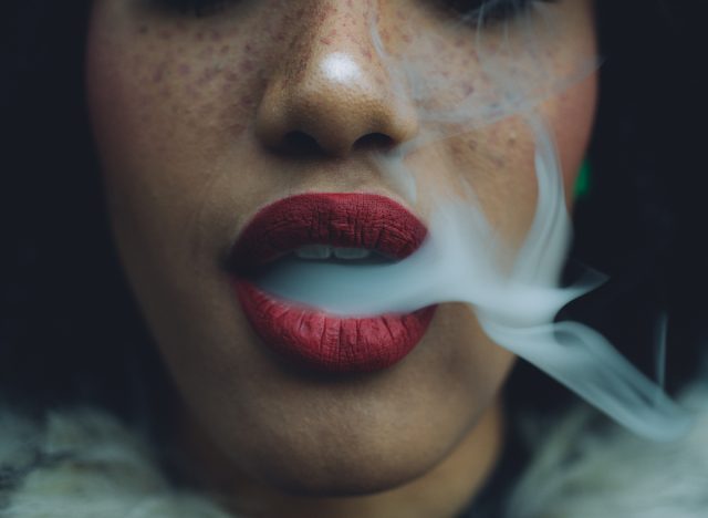 woman smoking vaping marijuana