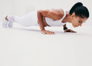 woman doing plank as part of 12-week bridal bootcamp workout
