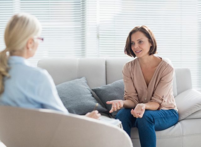 woman speaking with therapist in office after being betrayed by a best friend