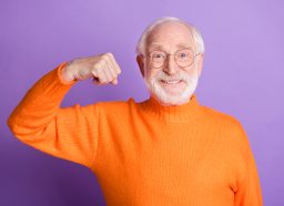 Older man flexing muscles