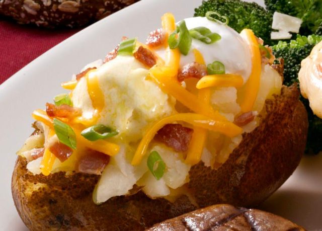black angus steakhouse loaded baked potato and steamed broccoli
