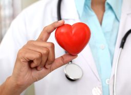 doctor holding heart