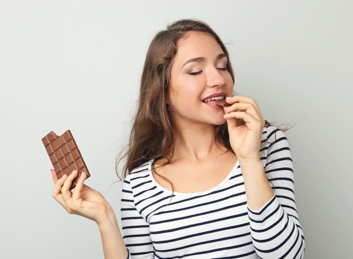 Eating chocolate bar
