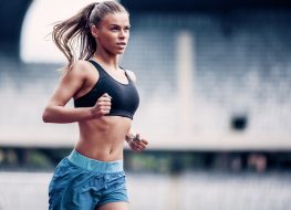 fit woman running, doing exercises for a smaller waist