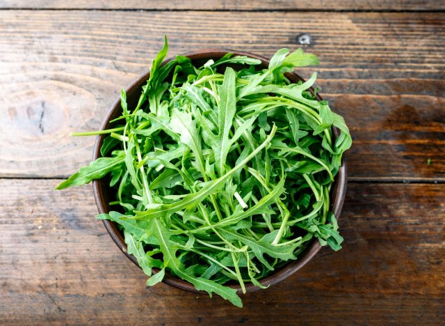 fresh arugula in bowl