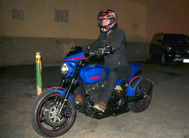 Keanu Reeves riding his motorcycle