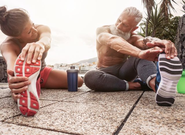 mature couple stretching