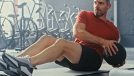 mature man medicine ball exercise demonstrating getting a fitter body after 50