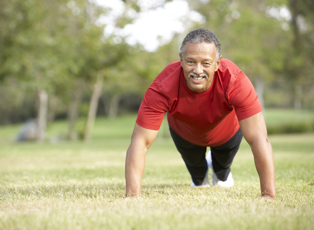 Mature senior man plank