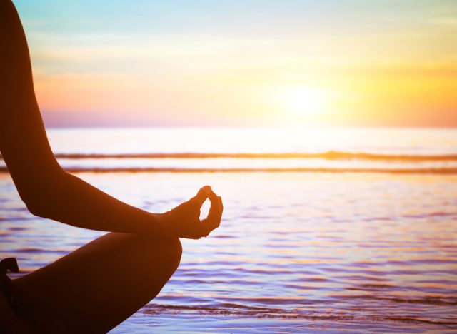 meditation silhouette at sunset