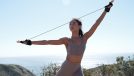 woman performing outdoor exercise, demonstrating how to prepare your body for menopause at 30