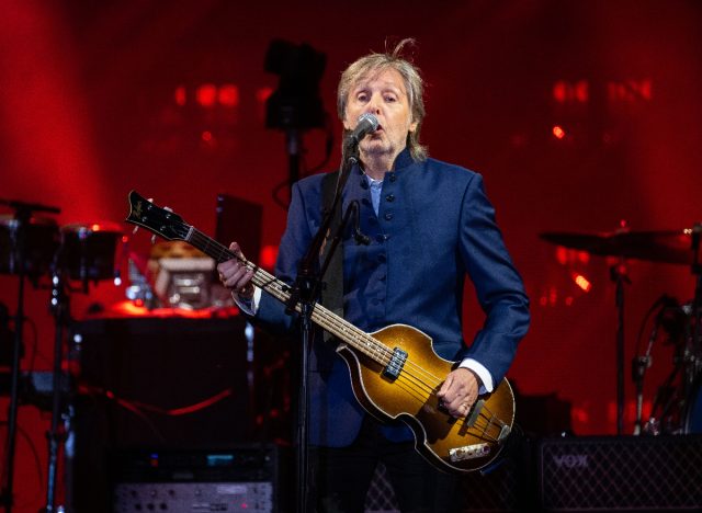 Paul McCartney performs on stage