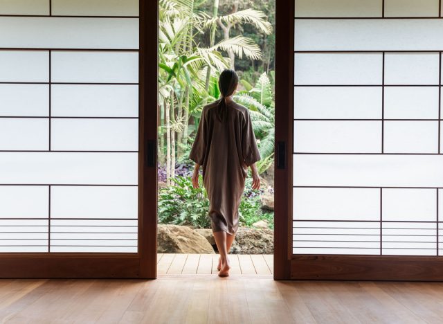 woman relaxed at Sensei Lanai wellness retreat, relaxing depiction of healthy eating and exercise habits