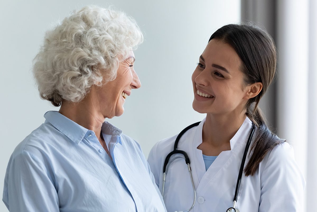 Smiling,Caring,Young,Female,Nurse,Doctor,Caretaker,Assisting,Happy,Senior, patient