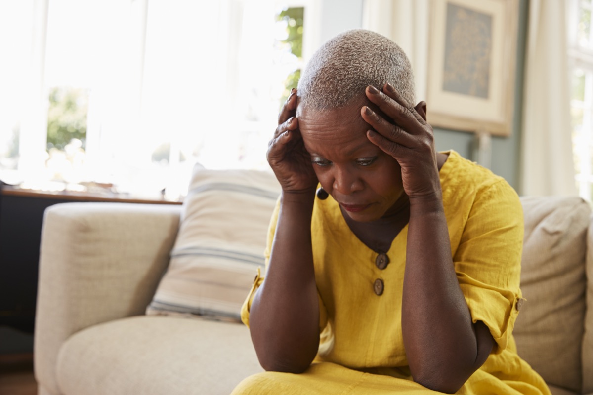 Senior,Woman,Sitting,On,Sofa,At,Home,Suffering,From,Depression, dementia