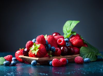 strawberries, blueberries, raspberries, and cherries