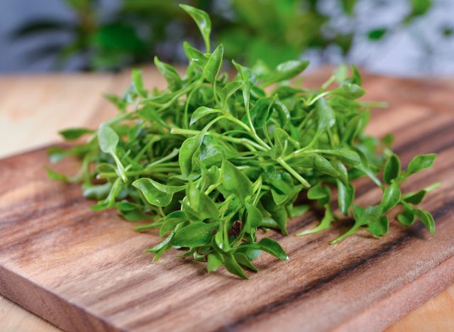 The 10 Benefits of Watercress - watercress on cutting board