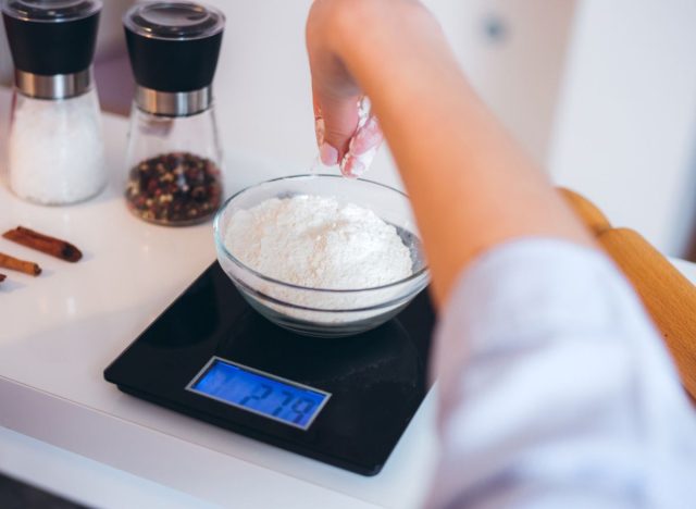 weighing flour on a scale