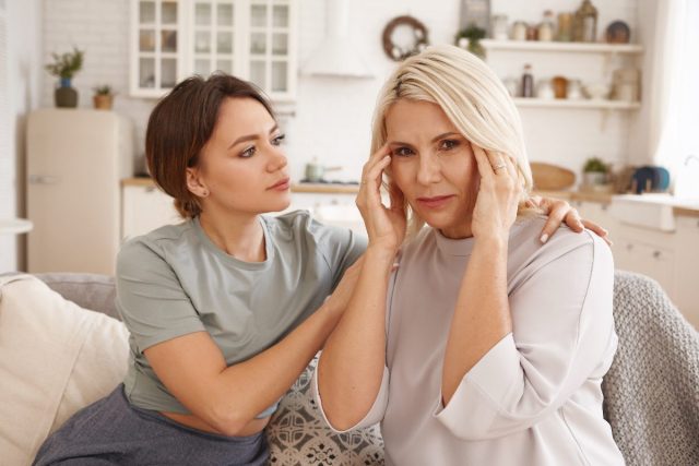 mother, daughter demonstrating how to recognize the signs of a stroke in a loved one