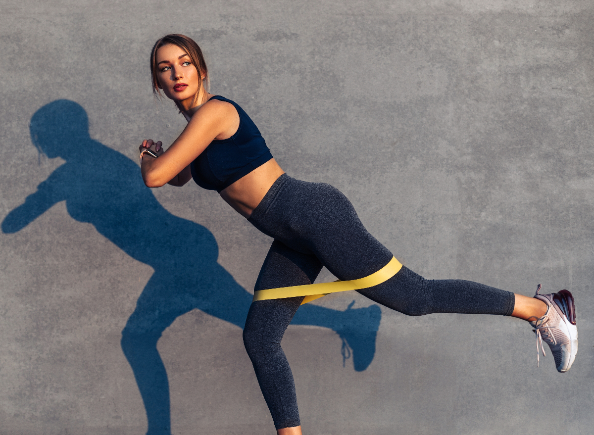 woman demonstrating workout to firm your buttocks