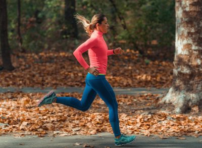 woman running, demonstrating what happens to your body when you work out seven days a week