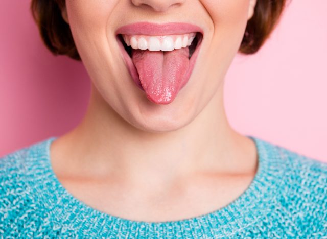 woman tongue exercise