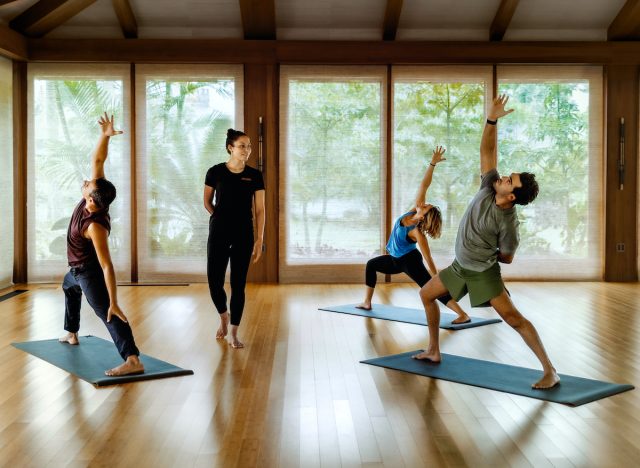 yoga class at Sensei Lanai illustrating healthy eating and exercise habits