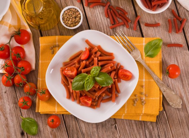 Red lentil pasta cooked with cherry tomatoes