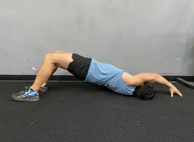 glute bridge with reach