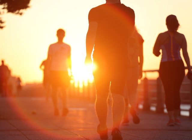 group of power walkers, demonstrating Centurion race walkers at sunset