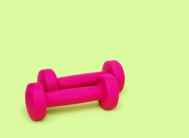 set of hot pink dumbbells