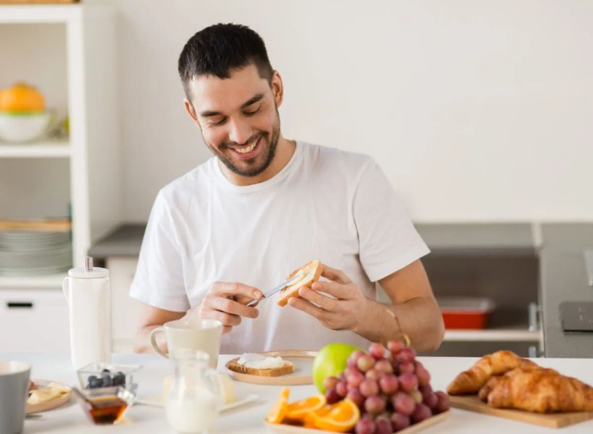 man eating breakfast