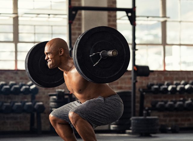 man performing heavy weight lifting, unhealthy workout habits that increase your risk of death