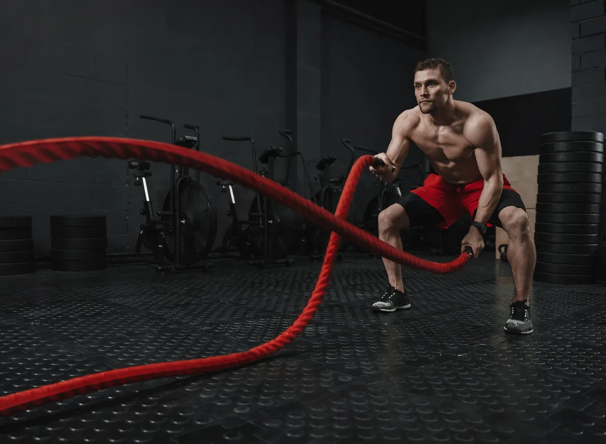 man performing intense workout, demonstrating what working out too much does to your body