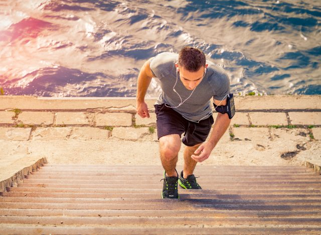 man fitness stair climbing, demonstrating workouts that'll get you walking every day