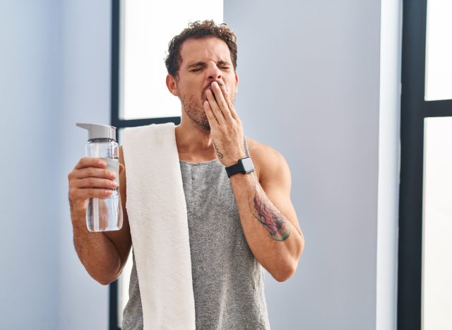 man tired, fatigued during workout