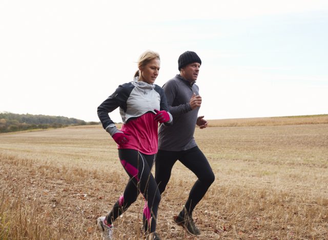 mature couple running