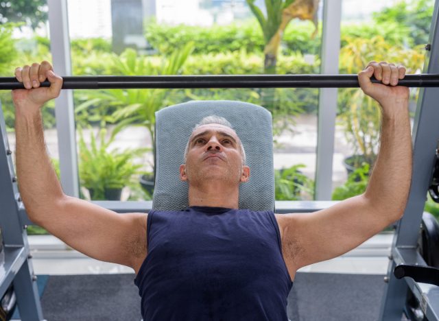 mature man incline bench press